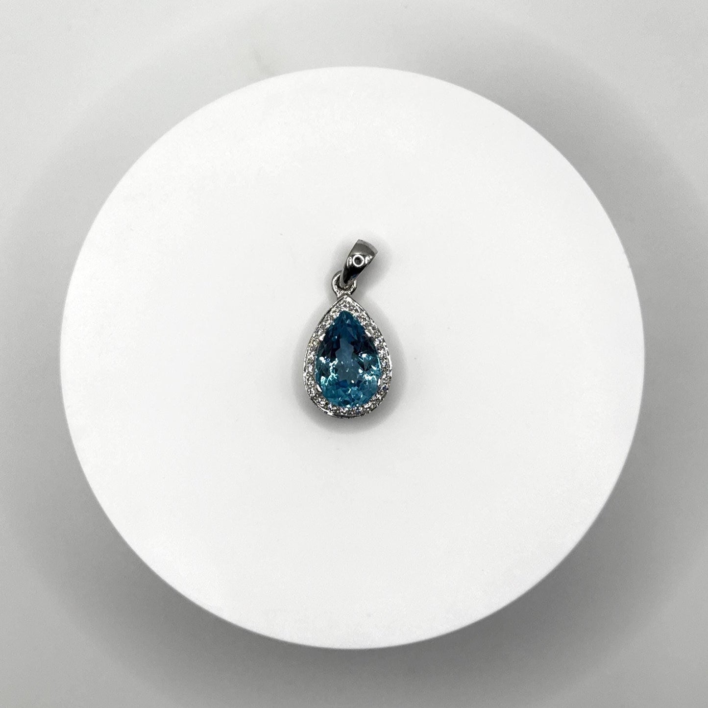 Swiss Blue Topaz Pear-Shaped Pendant with Halo - 10.75 Grams