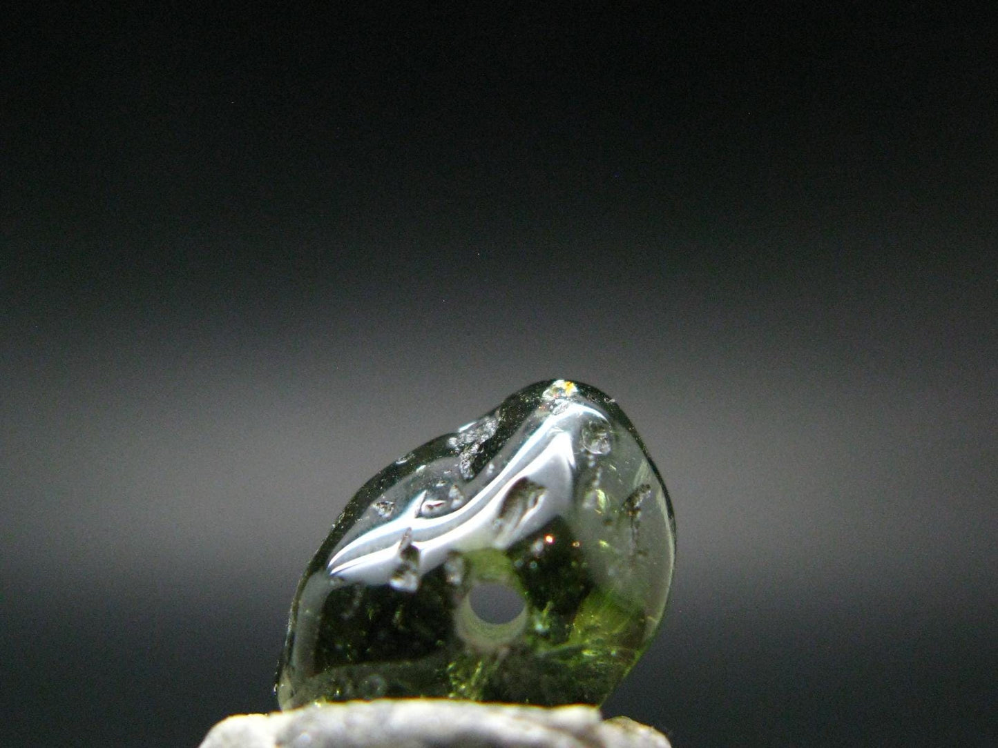 Moldavite Tektite Tumbled Bead from Czech Republic - 11 mm - 3.20 Carats