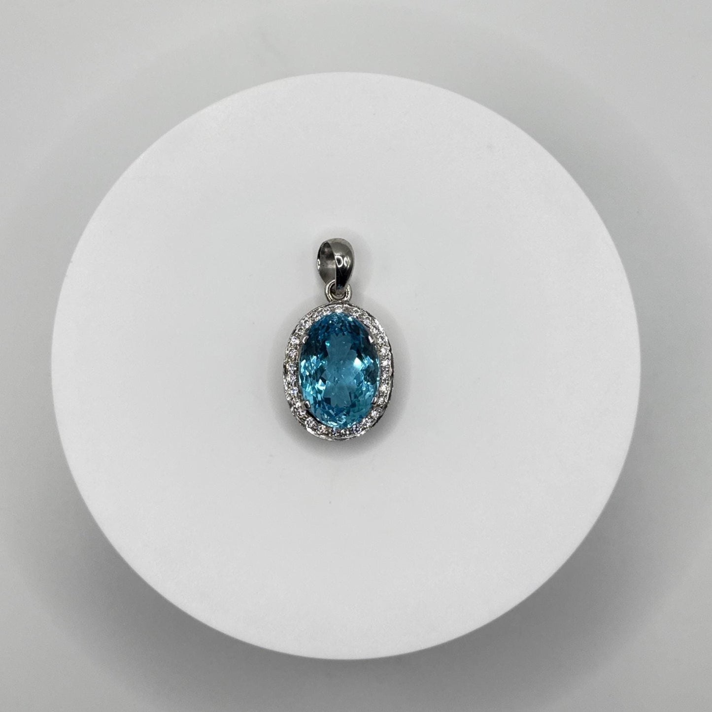 Swiss Blue Topaz Oval Pendant with White Zircon Halo - 17.46 Grams