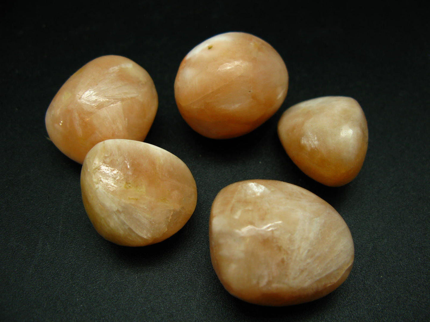 Lot of 5 tumbled Salmon-pink Stilbite (zeolite group) Stones from India