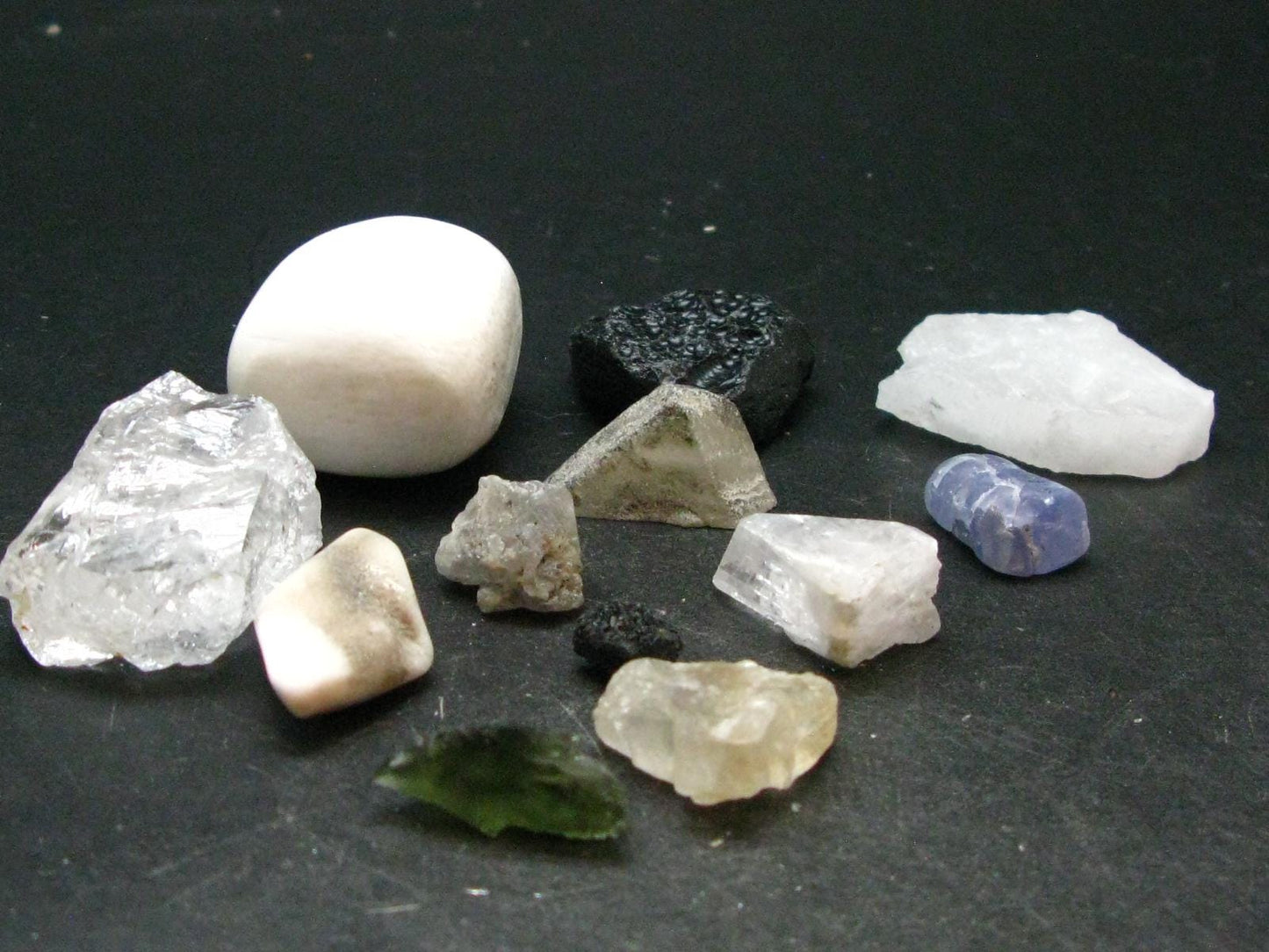 Synergy 12 Set Phenakite Moldavite Natrolite Petalite Danburite Tektite Scolecite Herderite Tanzanite Brookite 91.85 Gr