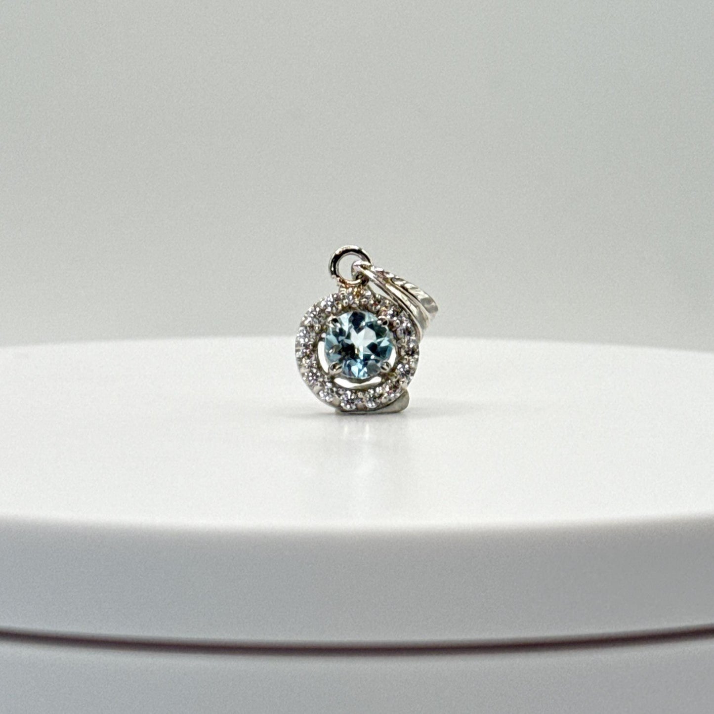 Sky Blue Topaz Infinity Halo Pendant in Sterling Silver - 2.02 Grams