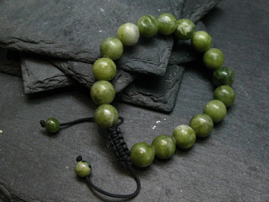Jade Genuine Bracelet ~ 7 Inches ~ 10mm Round Beads - w/ Drawstring