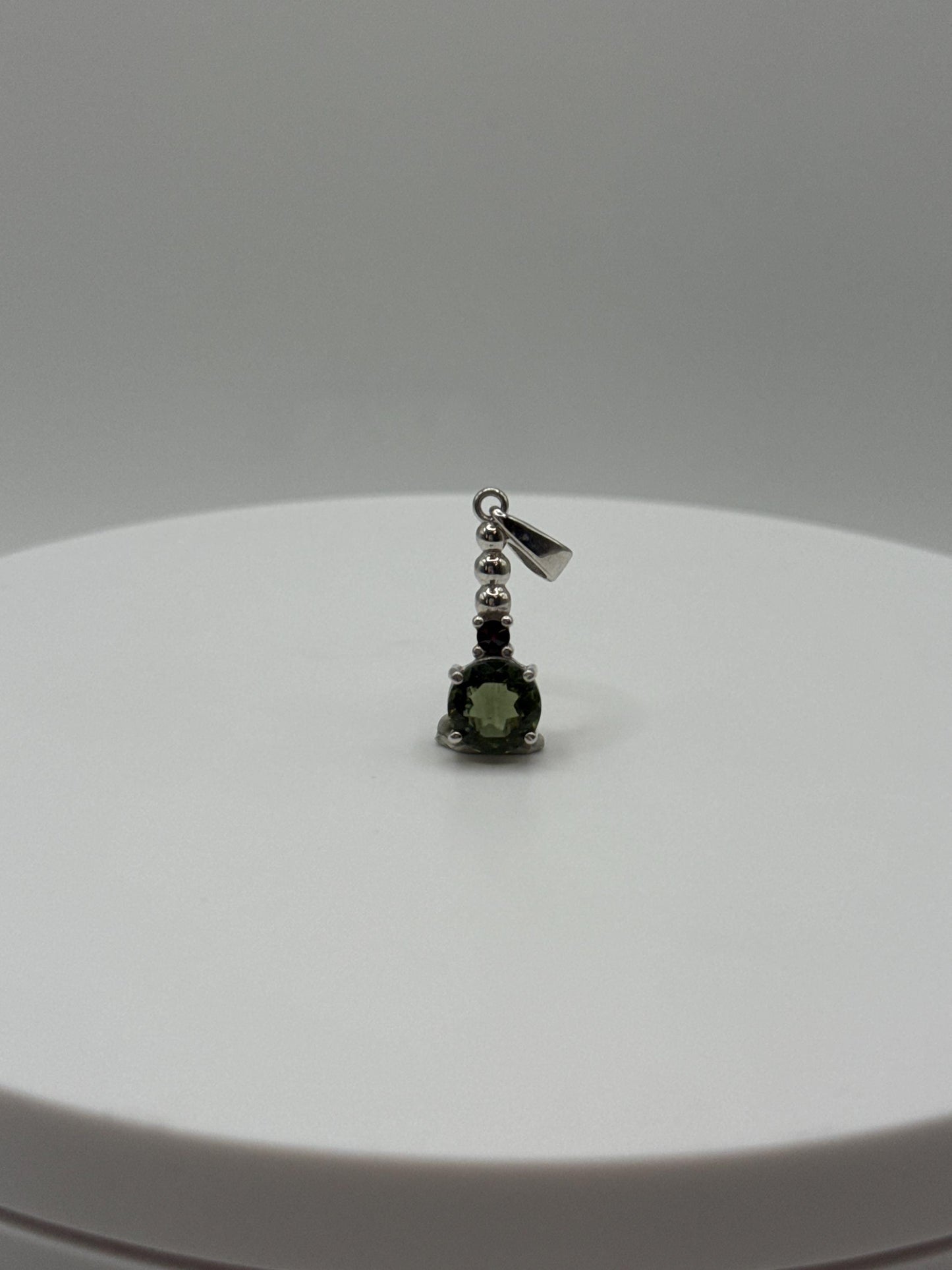 Sterling Silver Moldavite Pendant Round Cut with Garnet Accent - 1.29 Grams