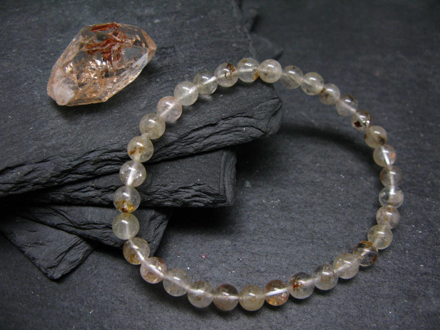 Rare Petroleum Oil In Quartz Crystal Bracelet - 7 Inches - 6mm Round Beads