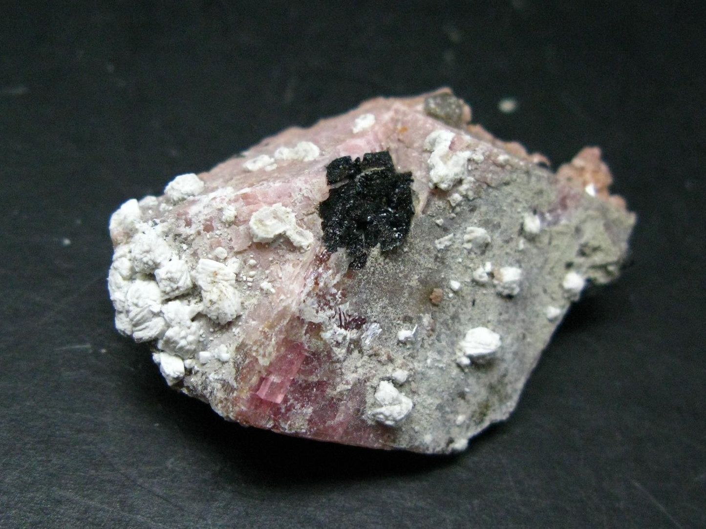 Rare Rhodochrosite crystal from Canada - 1.7"