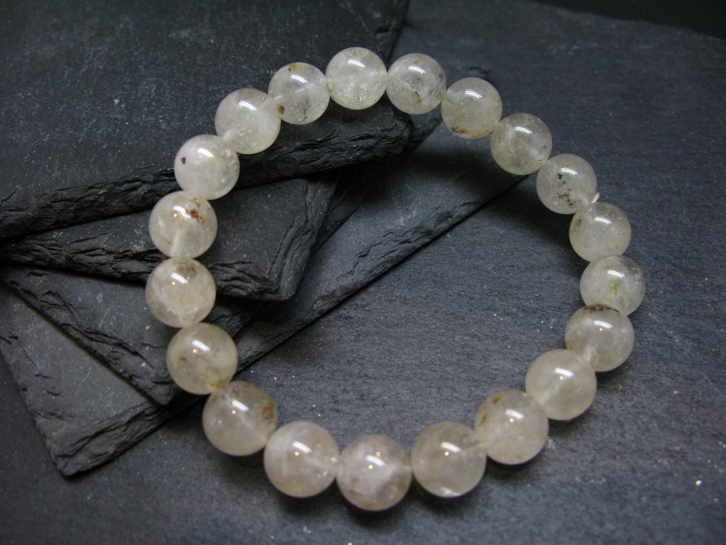 Rare Petroleum Oil In Quartz Crystal Bracelet - 7 Inches - 10mm Round Beads