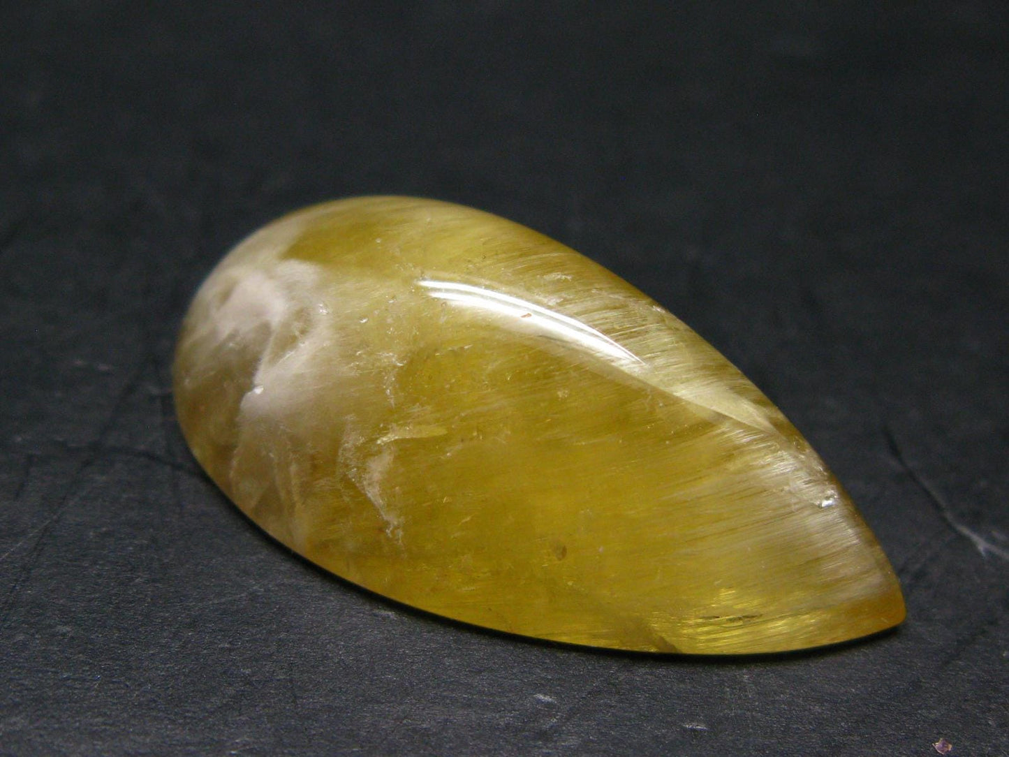 Rare Agni Gold Danburite Cabochon From Tanzania - 57.85 Carats - 1.4"