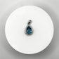 Swiss Blue Topaz Pear-Shaped Pendant with Halo - 10.75 Grams