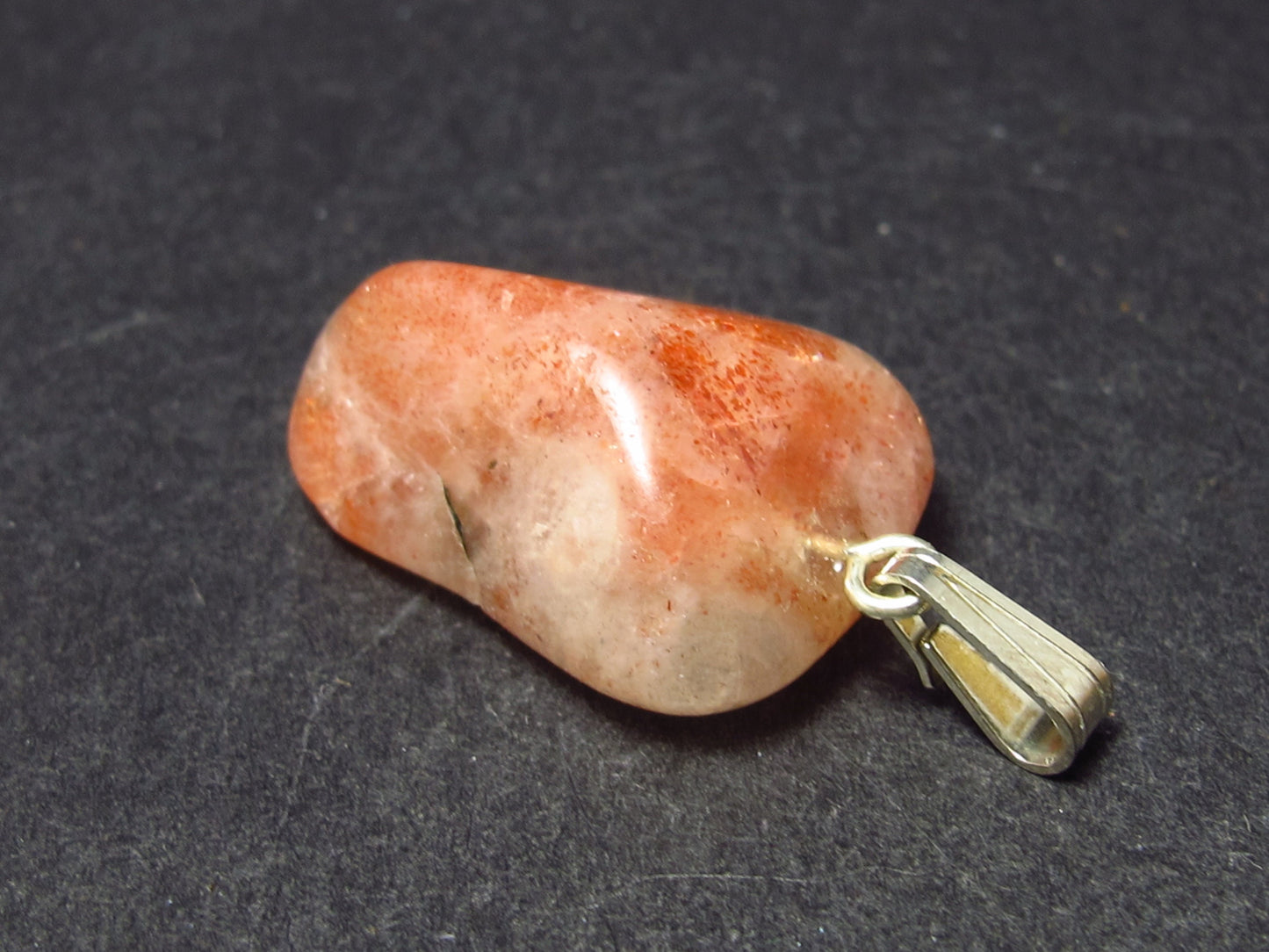 Tumbled Brightly Polished Sunstone Silver Pendant From Tanzania - 1.1"