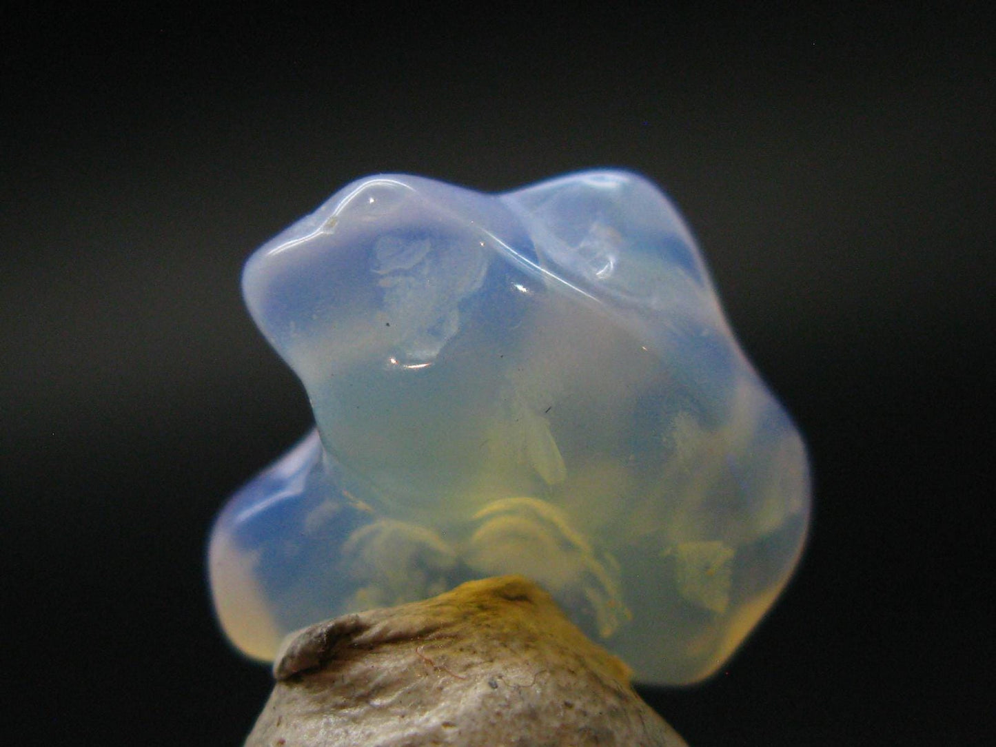 Natural Polished Opal With Play of Color from Ethiopia - 0.6" - 4.89 Carats