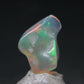 Natural Polished Opal With Play of Color from Ethiopia - 0.5" - 1.86 Carats