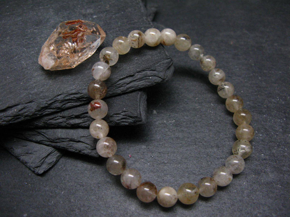 Rare Petroleum Oil In Quartz Crystal Bracelet - 7 Inches - 7mm Round Beads