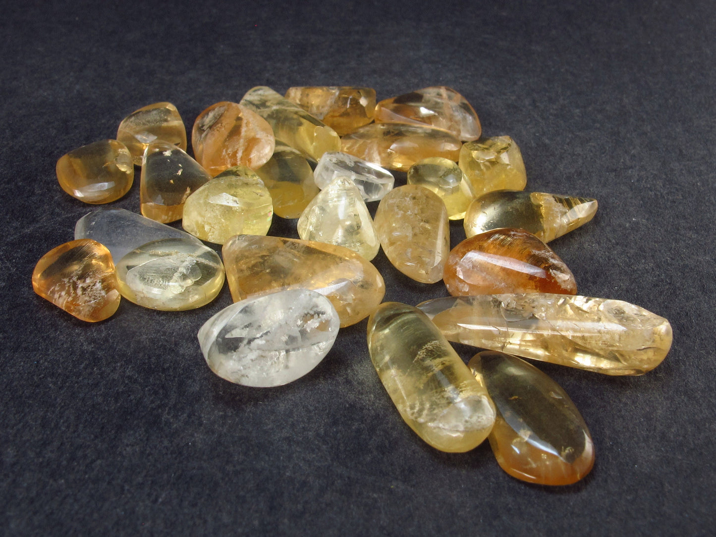 Lot of 25 Golden Scapolite Tumbled Stones from Tanzania - 138 Carats