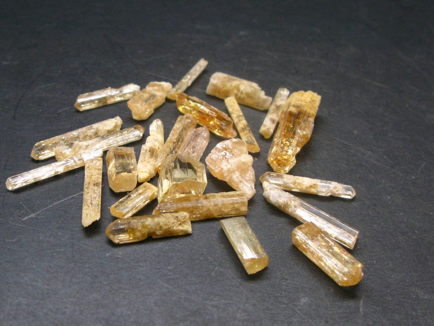 Lot of 25 Imperial Topaz Crystals From Brazil - 80.80 Carats