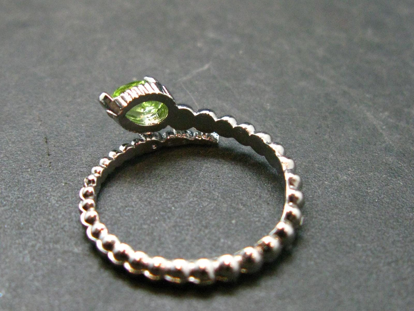 Natural Faceted Peridot Olivine Ring - 1.51 Grams - Size adjustable