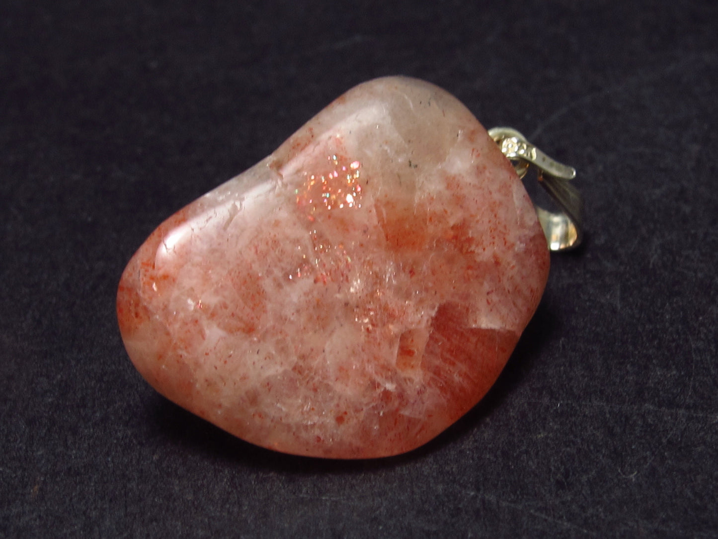 Tumbled Brightly Polished Sunstone Silver Pendant From Tanzania - 1.1"