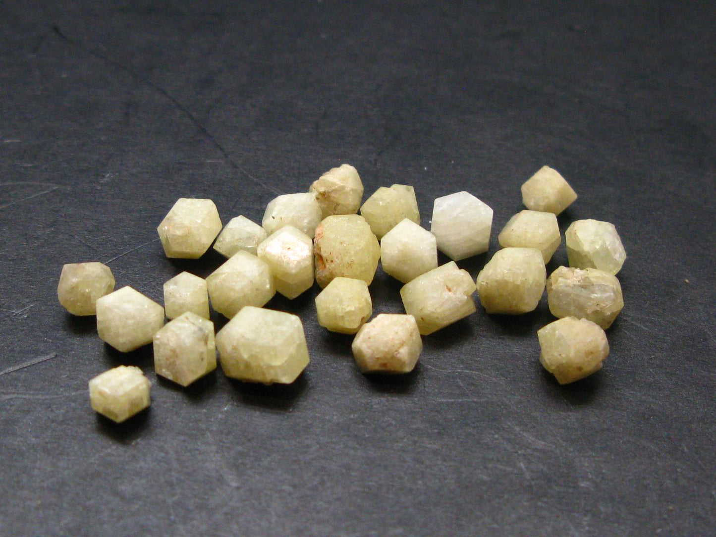 Lot of 25 Large Rhodizite Rhodozite Crystals from Madagascar - 23.20 Carats