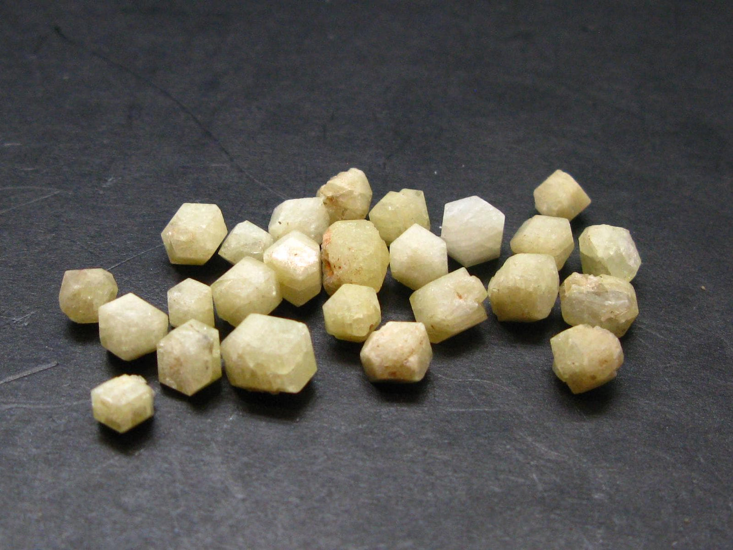 Lot of 25 Large Rhodizite Rhodozite Crystals from Madagascar - 23.20 Carats