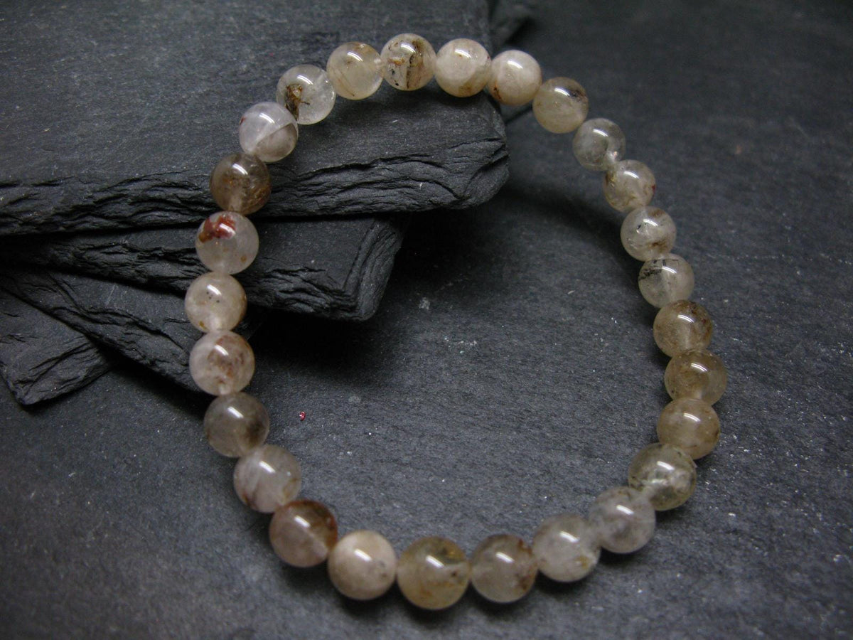 Rare Petroleum Oil In Quartz Crystal Bracelet - 7 Inches - 7mm Round Beads