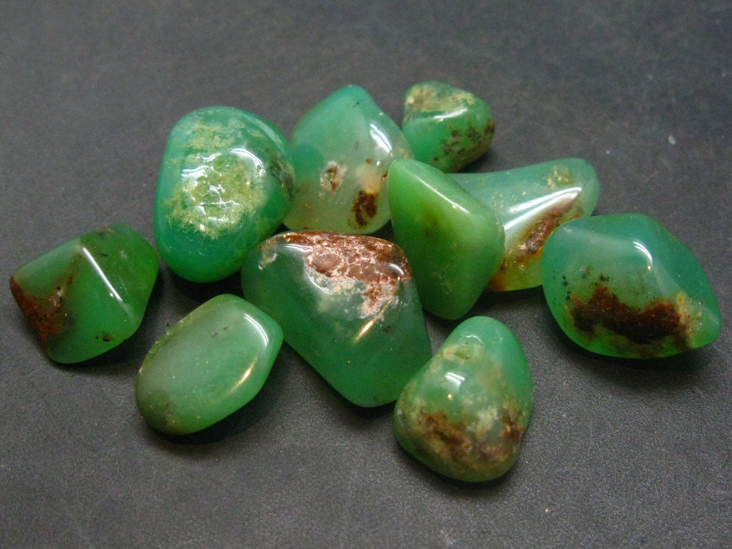 Lot of 10 natural tumbled apple-green Chrysoprase (variety of chalcedony) from Australia