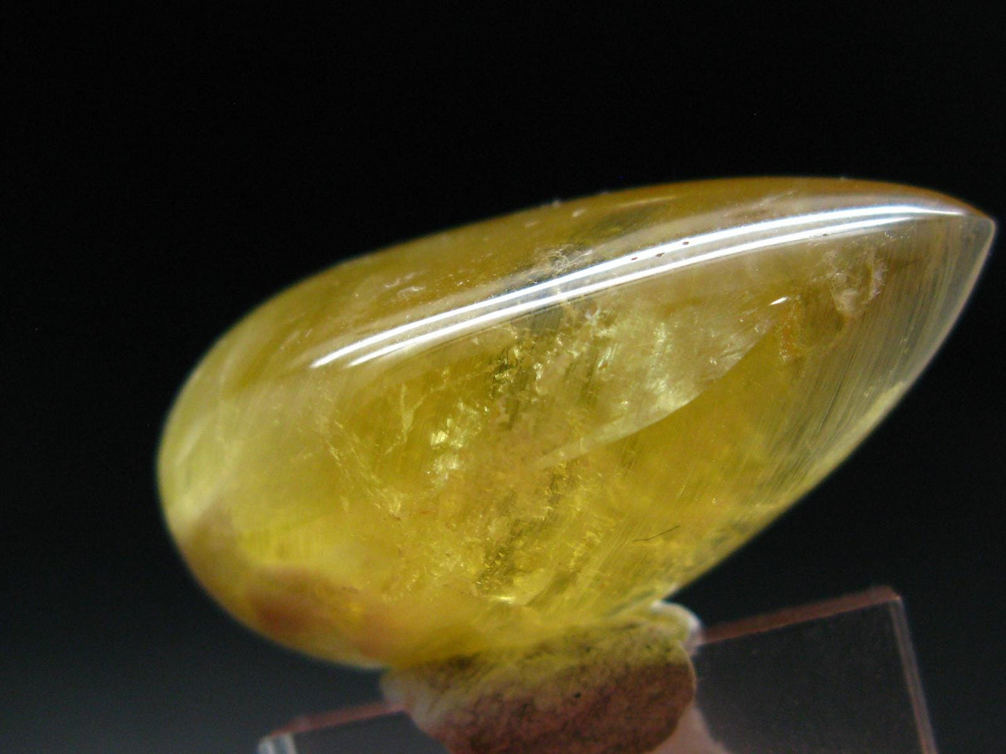 Rare Agni Gold Danburite Cabochon From Tanzania - 57.85 Carats - 1.4"