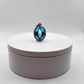 Swiss Blue Topaz Oval Pendant with White Zircon Halo - 17.46 Grams