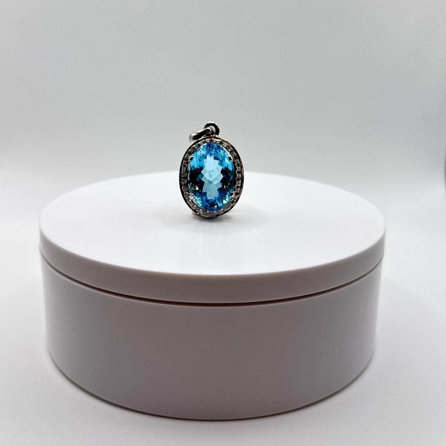 Swiss Blue Topaz Oval Pendant with White Zircon Halo - 17.46 Grams