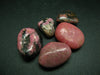 Lot of 5 natural Rhodonite tumbled stones from Canada