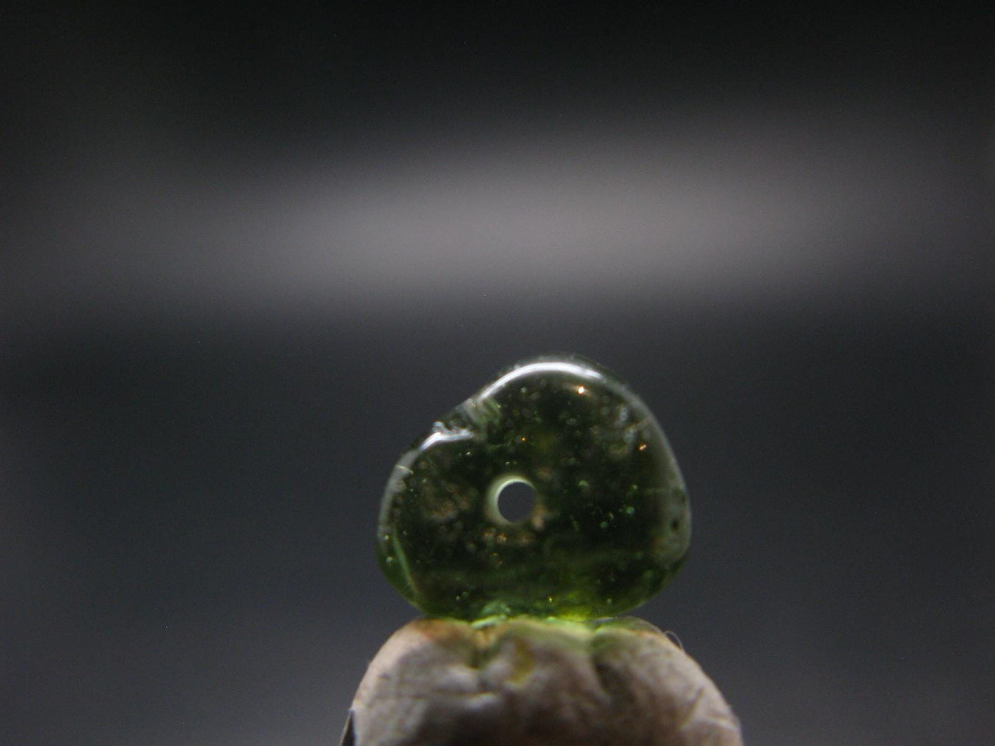 Moldavite Tektite Tumbled Bead from Czech Republic - 9 mm - 3.80 Carats