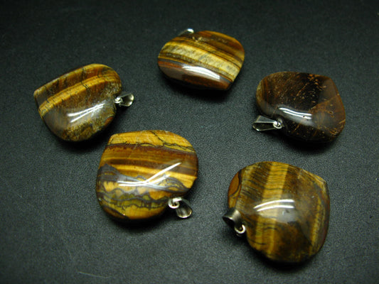 Lot of tiger eye heart shape pendants from Brazil