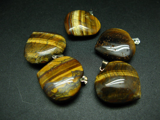 Lot of tiger eye heart shape pendants from Brazil