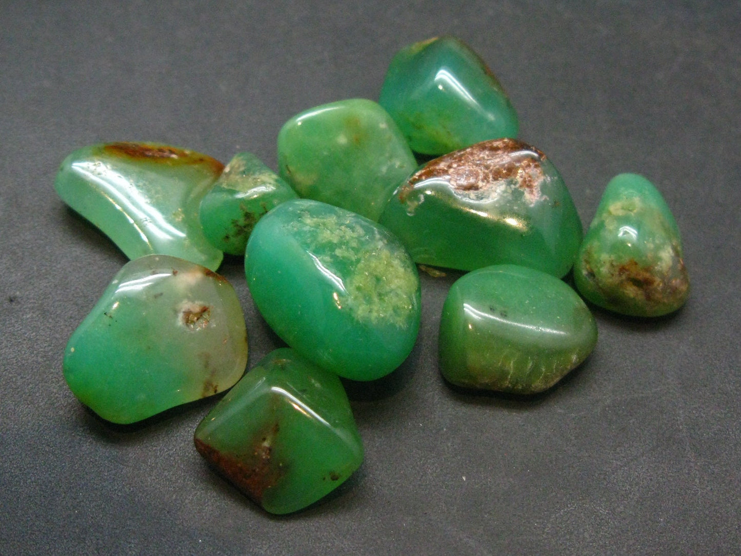 Lot of 10 natural tumbled apple-green Chrysoprase (variety of chalcedony) from Australia