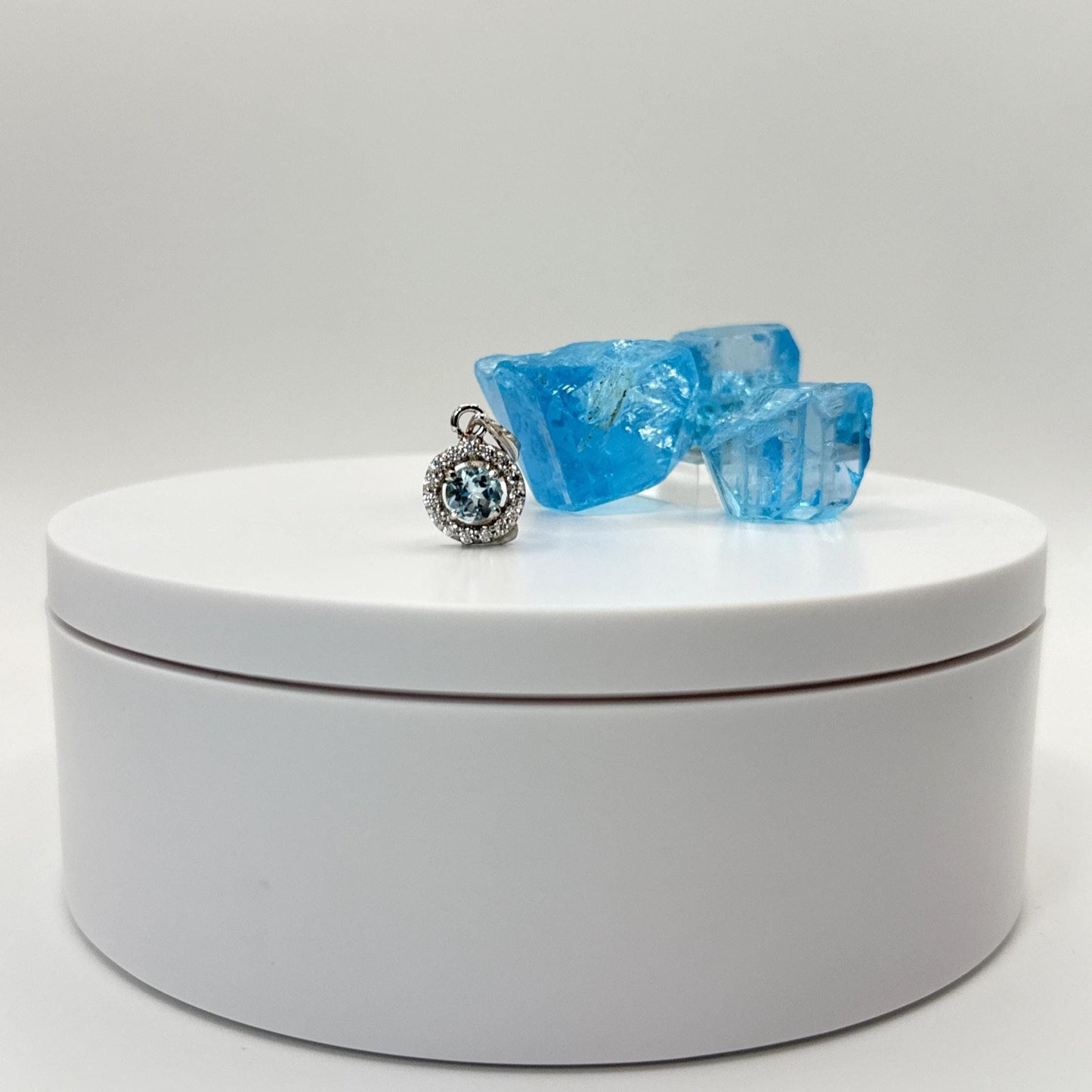 Sky Blue Topaz Infinity Halo Pendant in Sterling Silver - 2.02 Grams