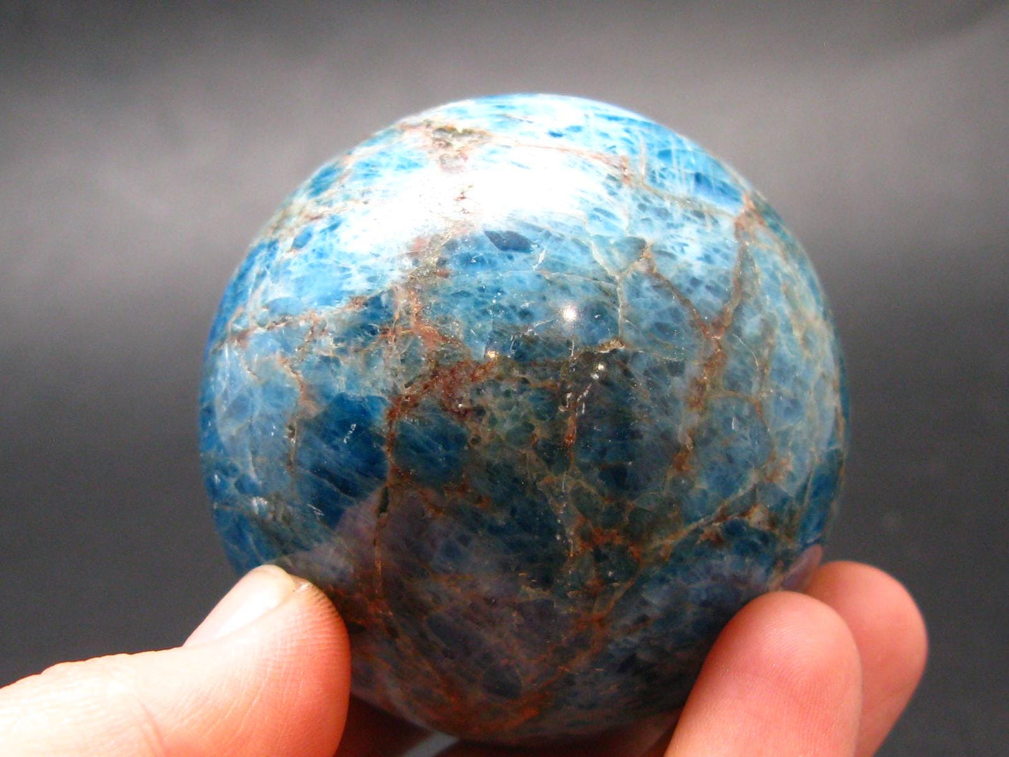 Large neon blue Apatite sphere from Madagascar- 258.18 - 2.0"