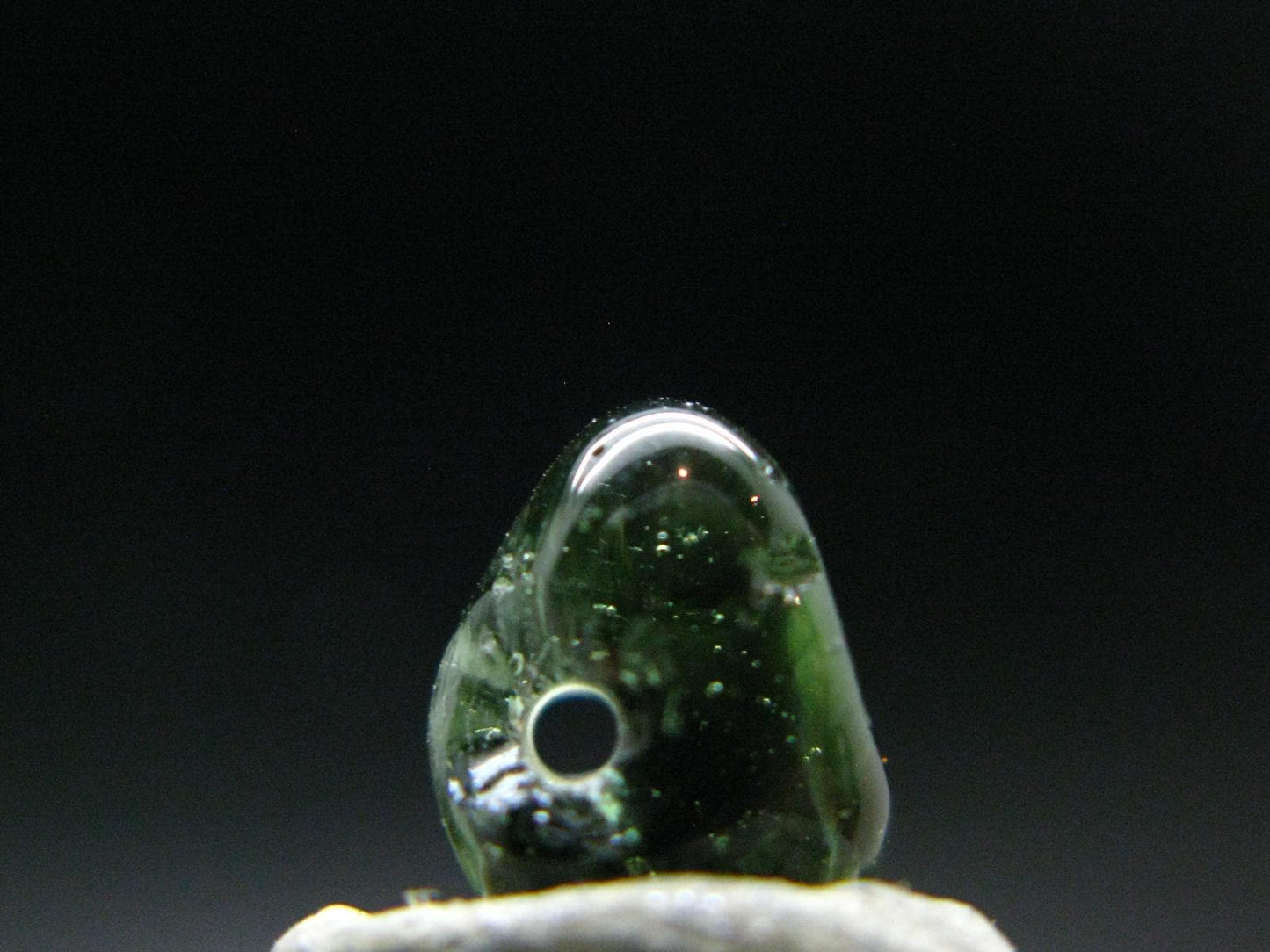 Moldavite Tektite Tumbled Bead from Czech Republic - 9 mm - 2.55 Carats