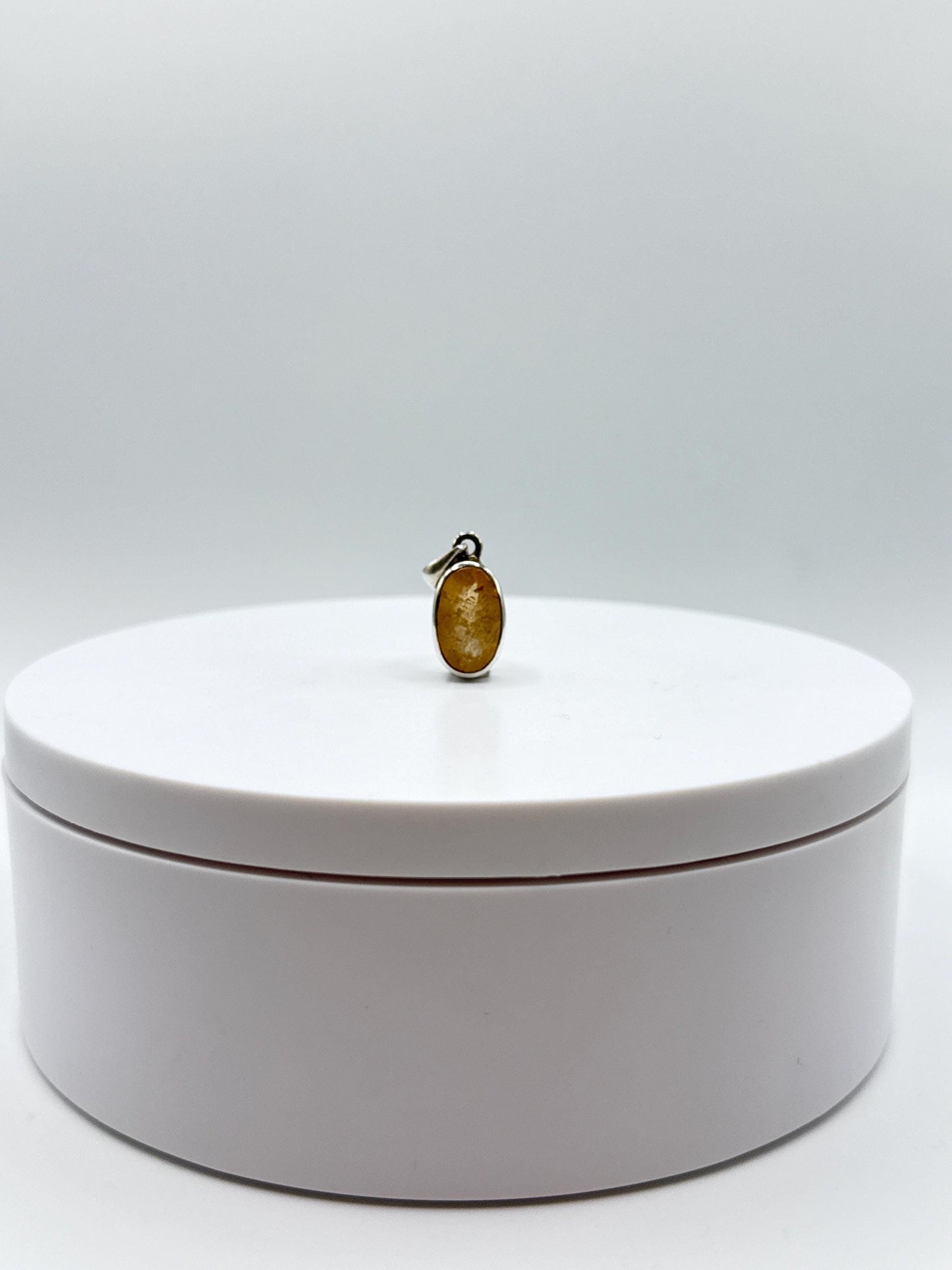 Oval Imperial Topaz Pendant in Sterling Silver - 3.36 Grams