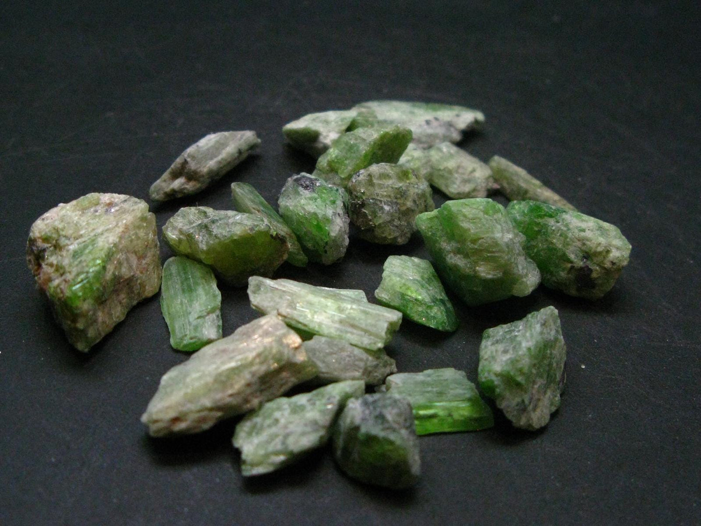 Rare Neon Tremolite Lot of 25 Crystals from Tanzania - 133.25 Carats