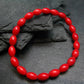 Red Coral Genuine Bracelet ~ 7 Inches ~ 9mm Oval Beads