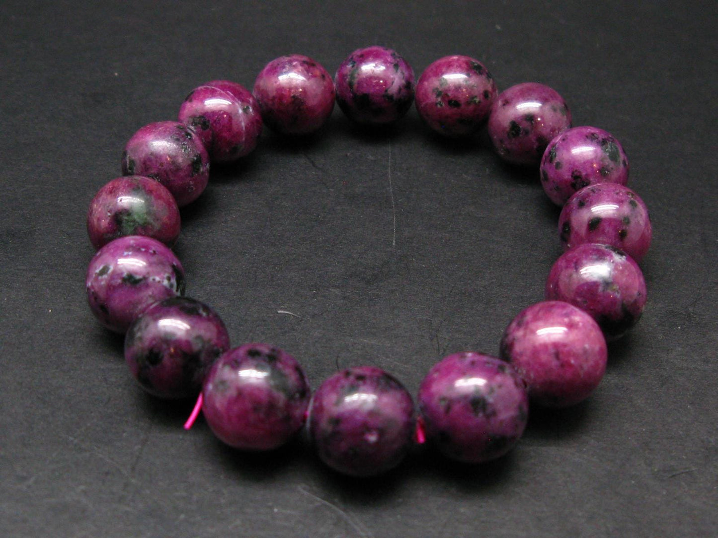 Ruby Genuine Bracelet ~ 7.5 Inches ~ 14mm Round Beads