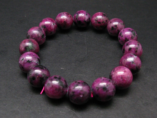 Ruby Genuine Bracelet ~ 7.5 Inches ~ 14mm Round Beads