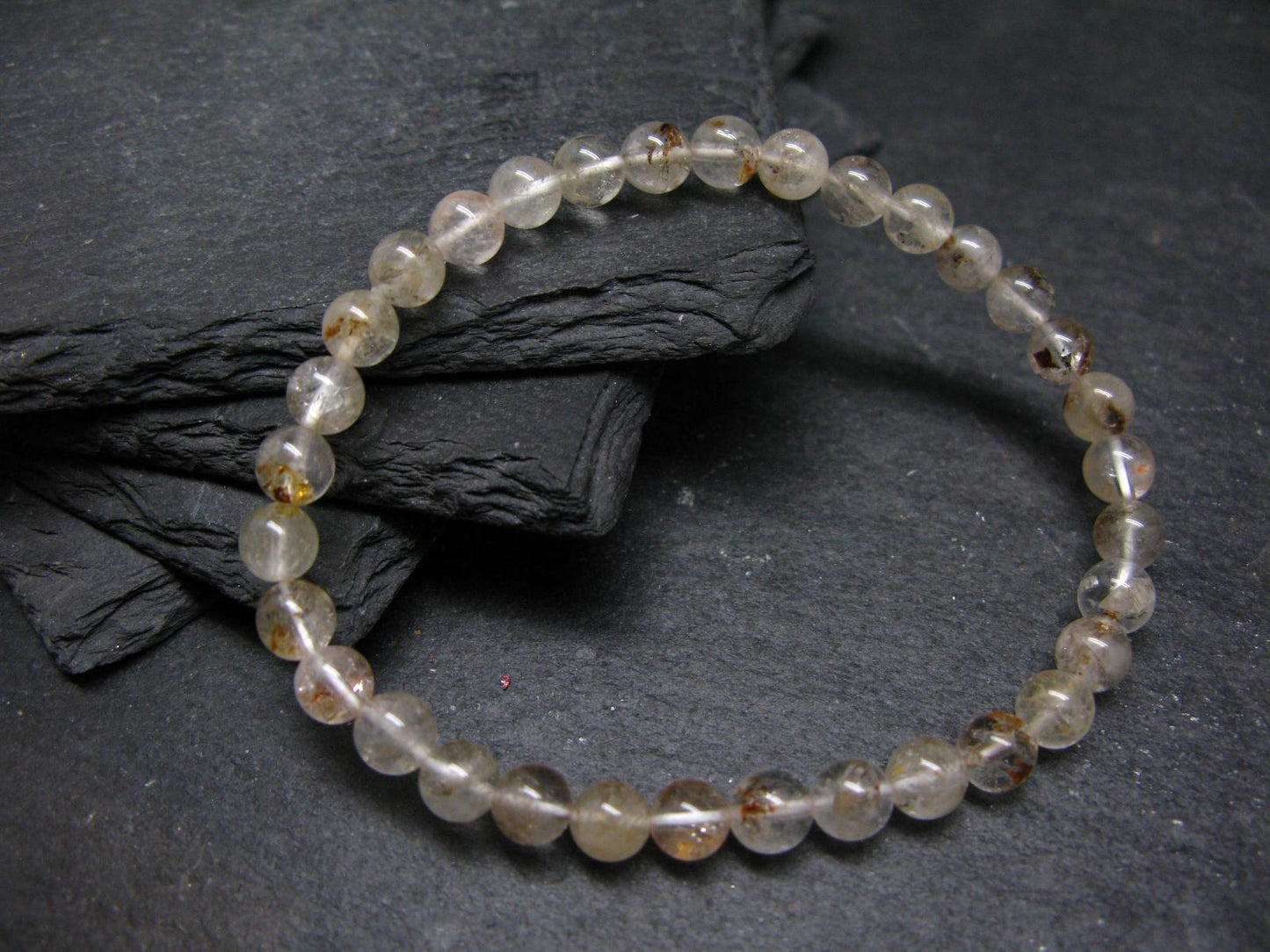 Rare Petroleum Oil In Quartz Crystal Bracelet - 7 Inches - 6mm Round Beads