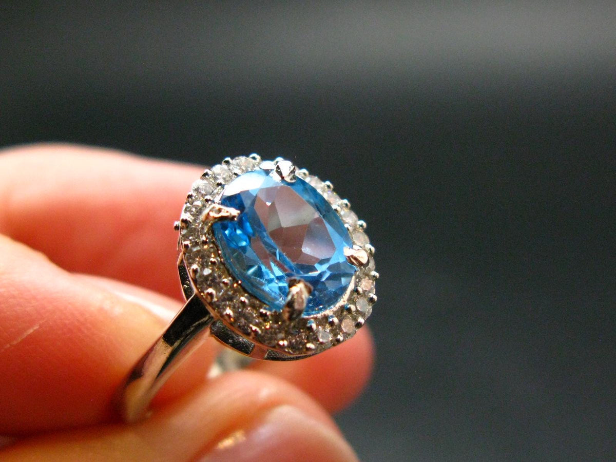 Natural Oval Shaped Facetted Blue Topaz Crystal Sterling Silver Ring - 3.32 Grams - Size 7.25