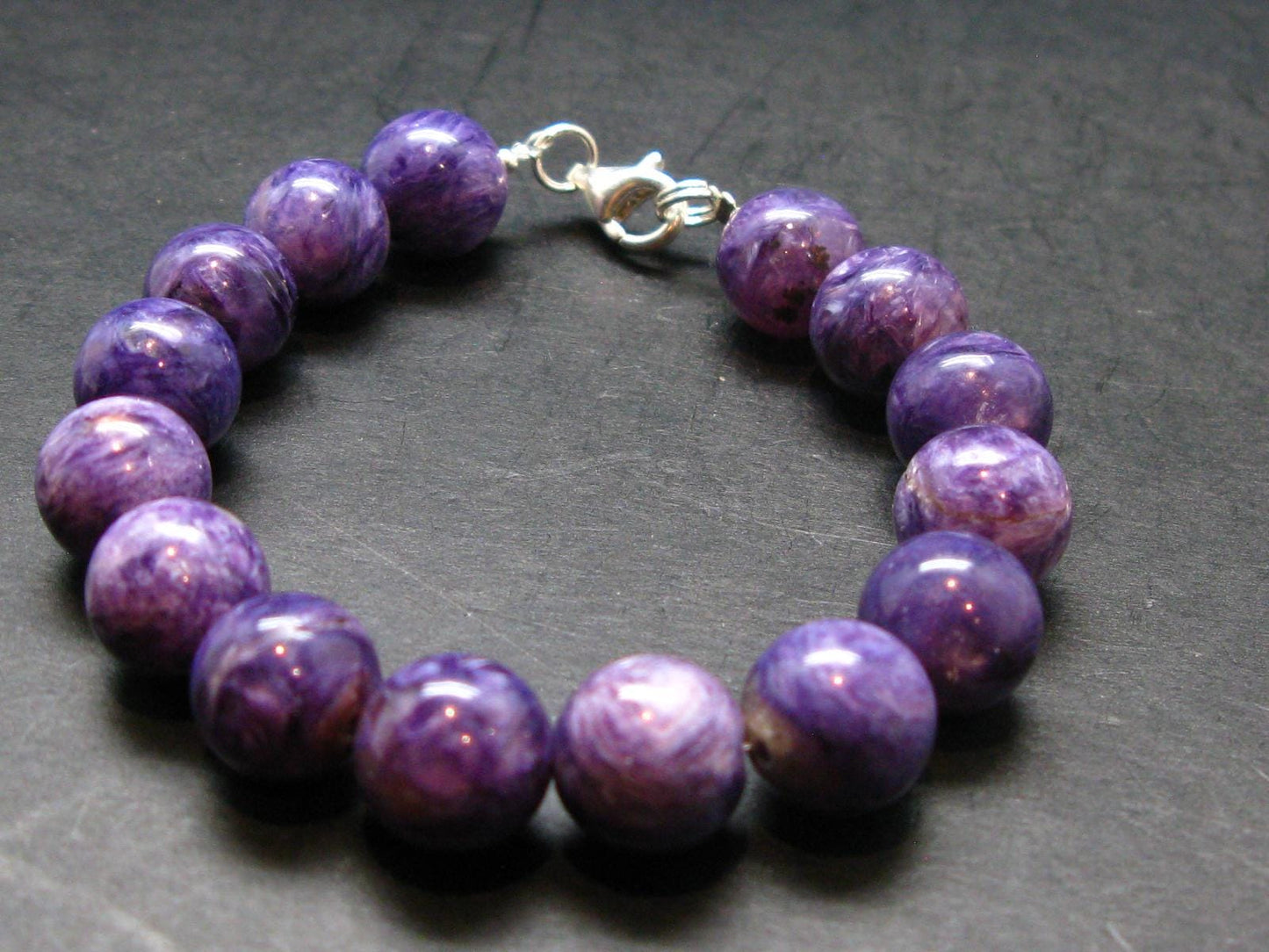 Charoite Genuine Bracelet - 25.84 Grams - 10mm Round Beads - 7 inches