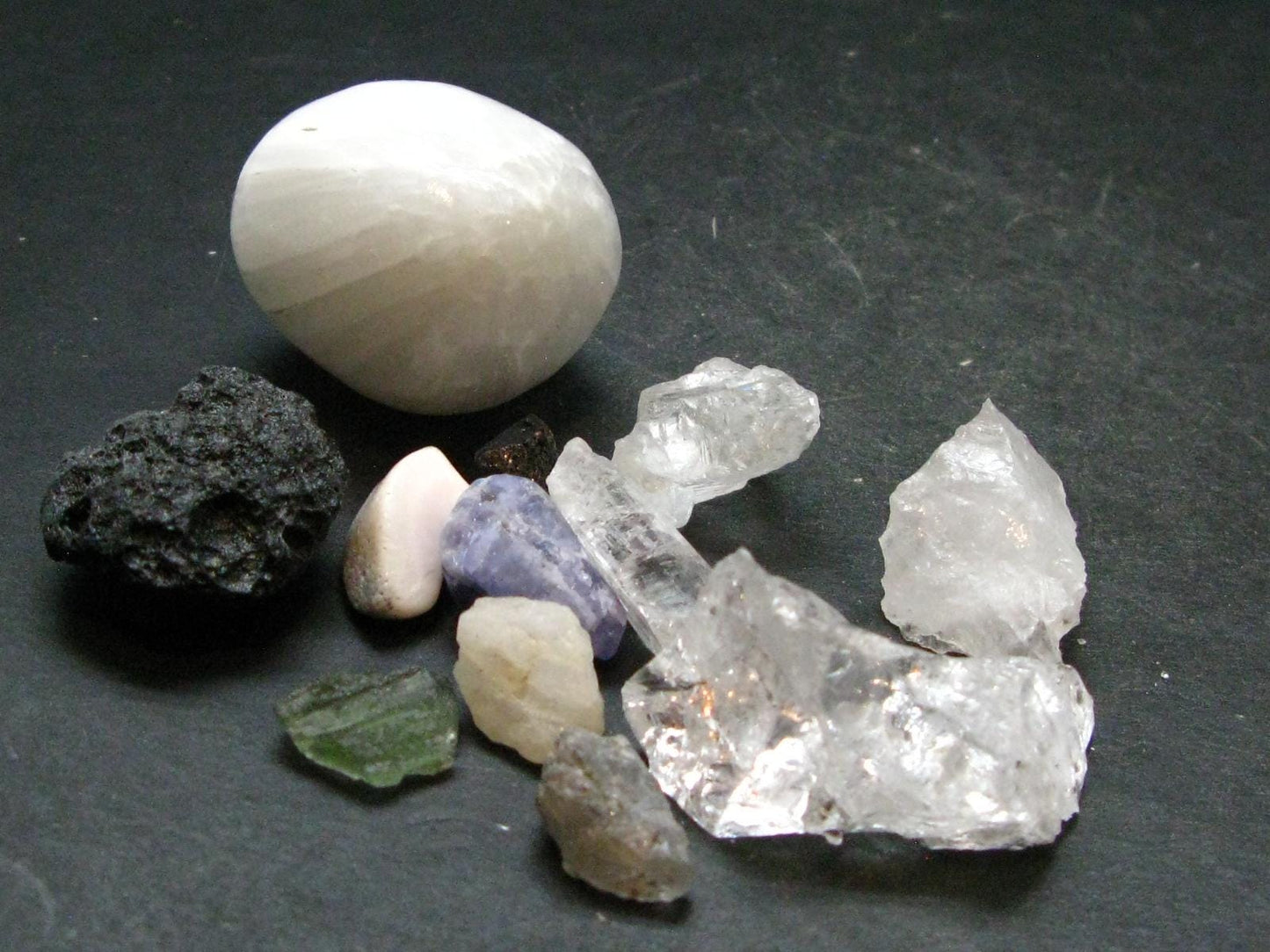 Synergy 12 Set Phenakite Moldavite Natrolite Petalite Danburite Tektite Scolecite Herderite Tanzanite Brookite 48.41 Gr