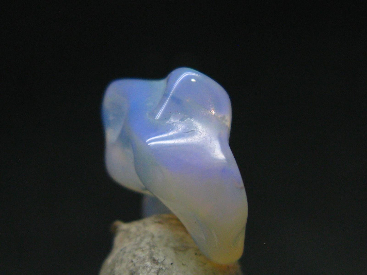Natural Polished Opal With Play of Color from Ethiopia - 0.6" - 4.89 Carats