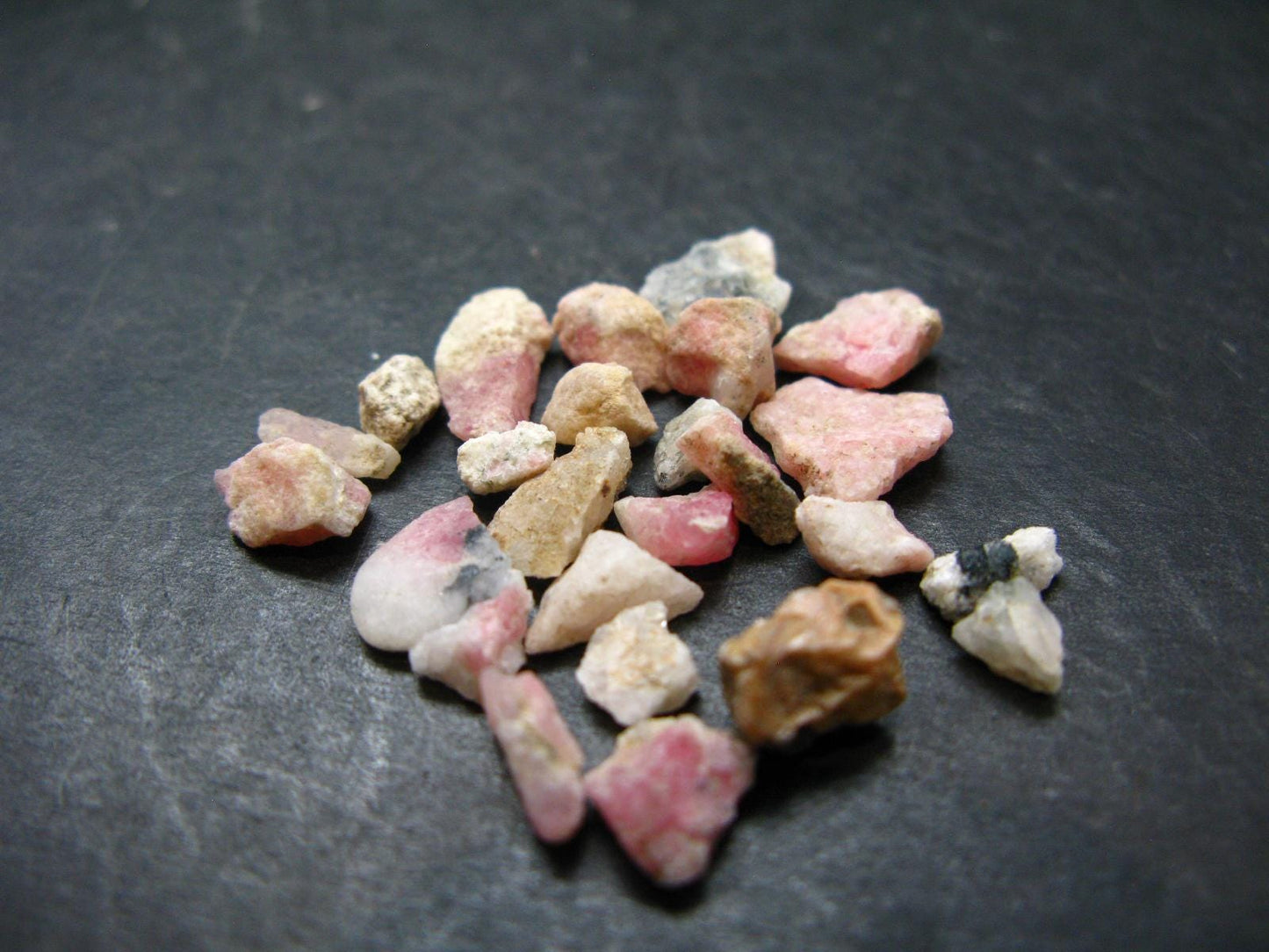 Lot of 25 Rare Pink Tugtupite Raw Pieces From Greenland - 4.22 Grams