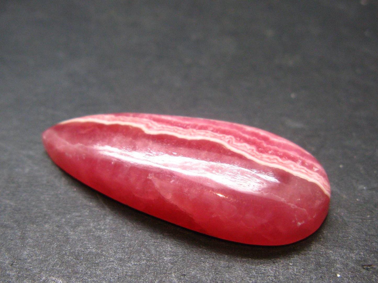 Rhodochrosite Cabochon From Peru - 7.38 Grams - 1.4"