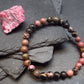 Rhodonite Genuine Bracelet ~ 7 Inches ~ 6mm Round Beads