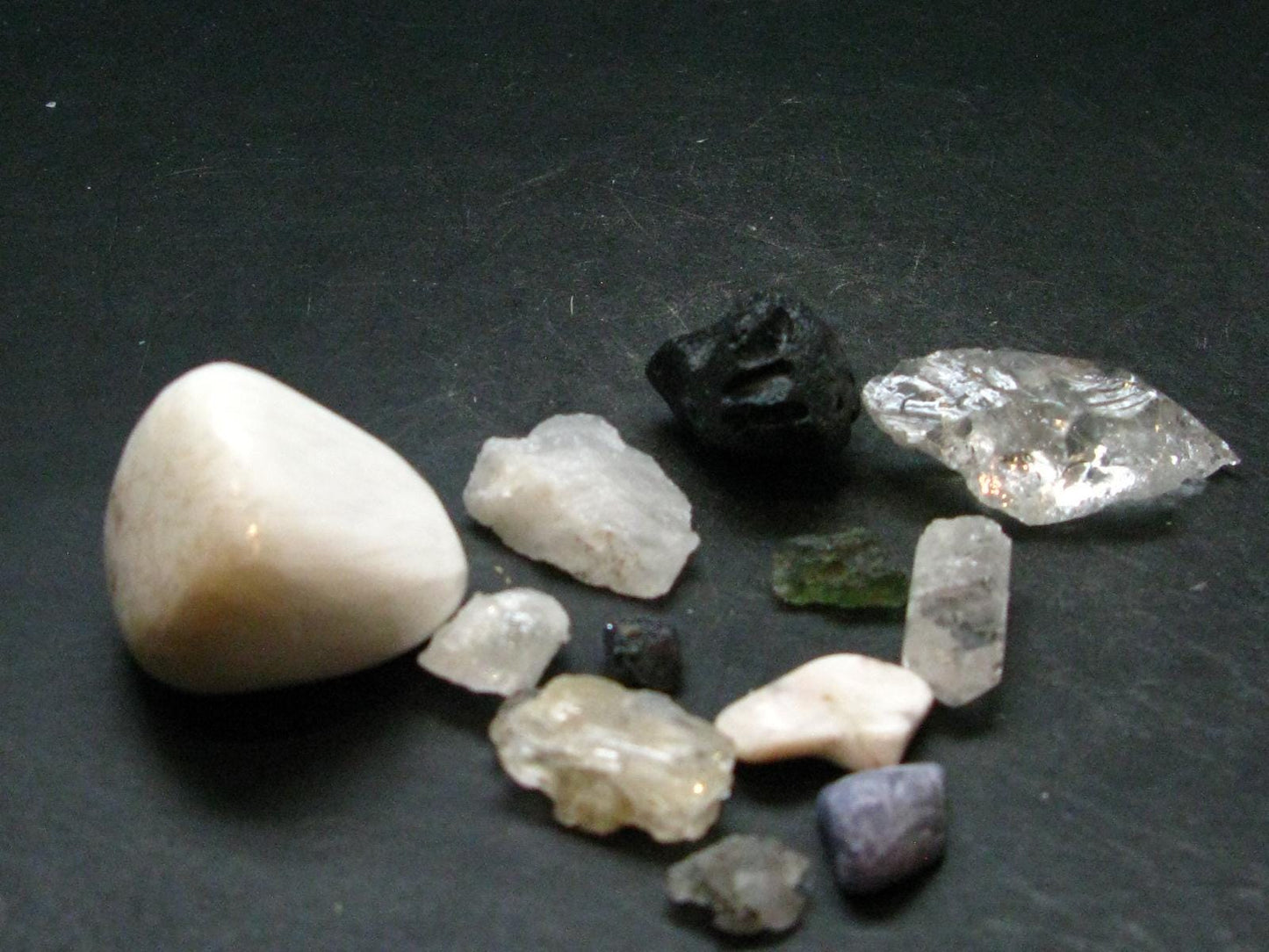 Synergy 12 Set Phenakite Moldavite Natrolite Petalite Danburite Tektite Scolecite Herderite Tanzanite Brookite 55.84 Gr